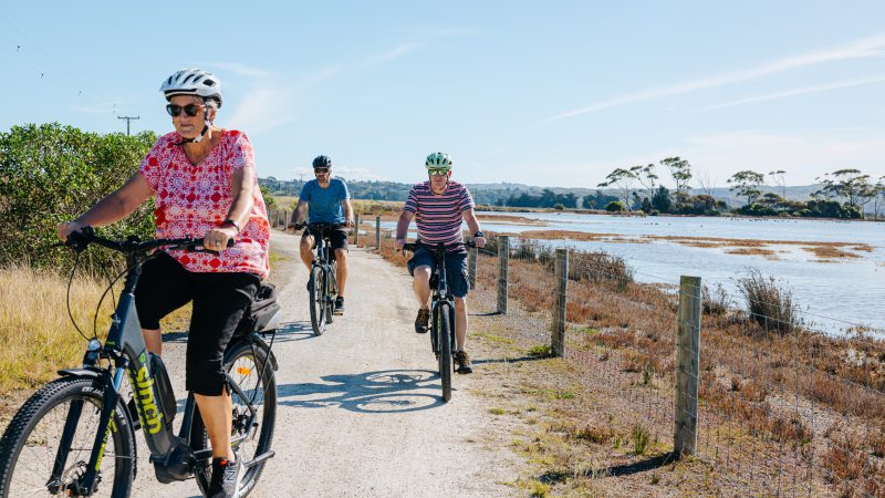 Three riders on the estuary path on the Hawke's Bay Trails