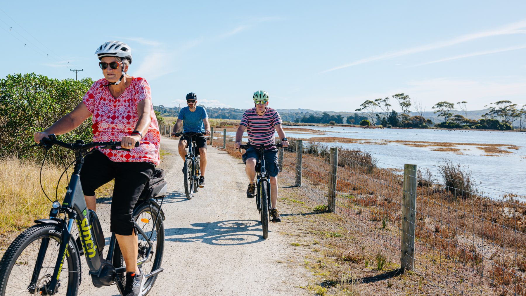 Three riders on the estuary path on the Hawke's Bay Trails