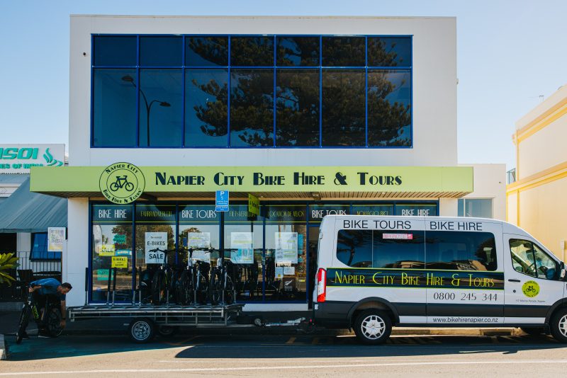 The Napier City Bike Hire shopfront with the tour van and bike trailer