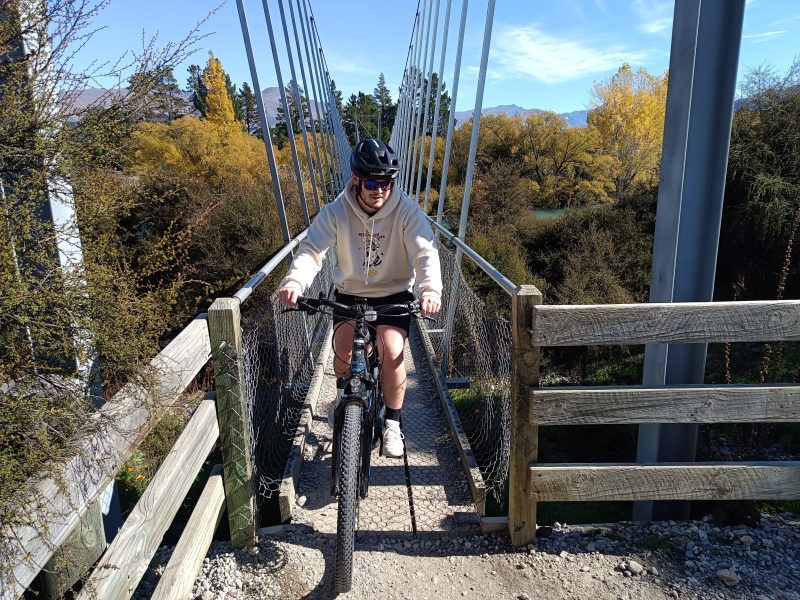 A rider crossing the Albert Town swing bridge
