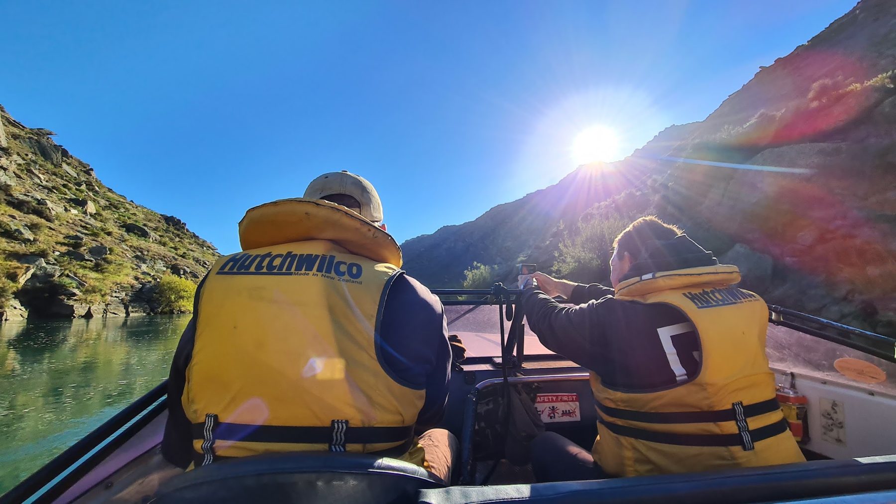 Riders aboard the jet boat that carries them through the Roxburgh Gorge