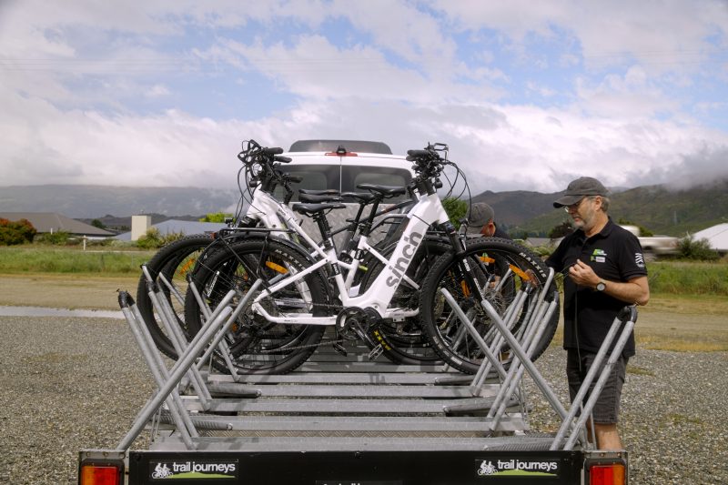 Trail Journeys e-bikes loaded on the support trailer